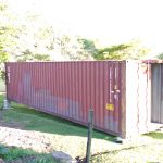 Before any exterior painting on the shipping container.